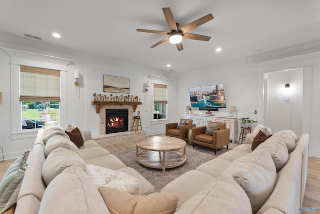 313 Merrydale Dr, Huntsville, AL 35811 - living room with light wood-type flooring, a glass covered fireplace, a ceiling fan, and recessed lighting