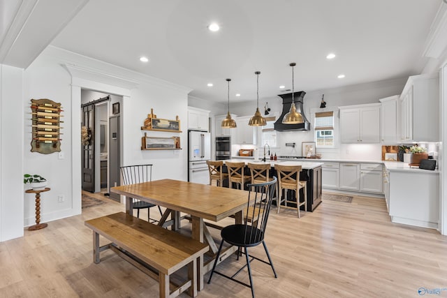 313 Merrydale Dr, Huntsville, AL 35811 - dining space featuring recessed lighting, ornamental molding, and light wood-style floors