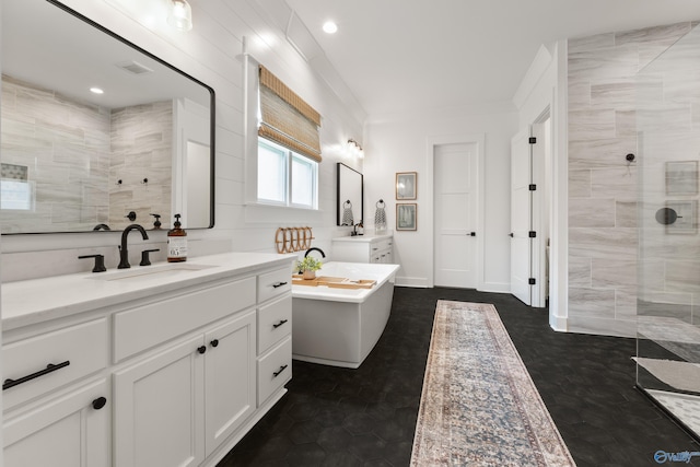 313 Merrydale Dr, Huntsville, AL 35811 - bathroom with vanity, walk in shower, a soaking tub, and recessed lighting