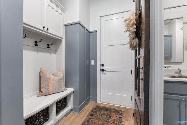 313 Merrydale Dr, Huntsville, AL 35811 - mudroom with light wood-style floors and a sink