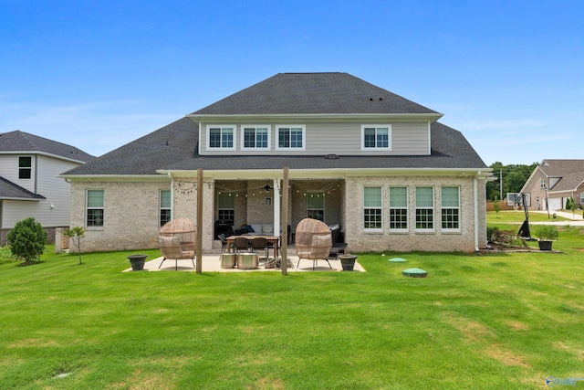 313 Merrydale Dr, Huntsville, AL 35811 - back of house featuring a patio, brick siding, a lawn, and outdoor lounge area