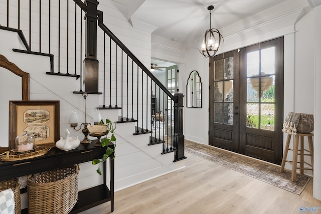 313 Merrydale Dr, Huntsville, AL 35811 - entrance foyer with stairway, wood finished floors, a chandelier, french doors, and a ceiling fan