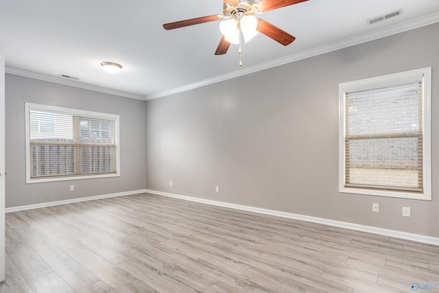 unfurnished room featuring crown molding, ceiling fan, and light wood-type flooring