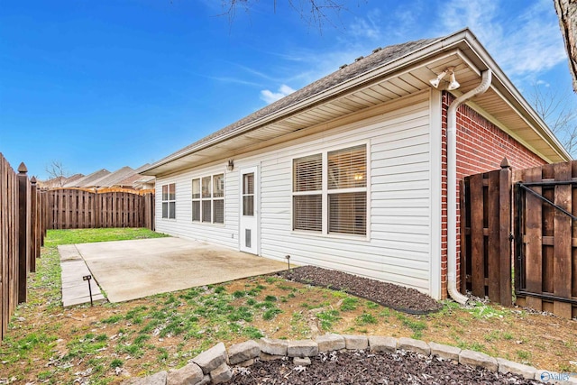 rear view of house featuring a patio