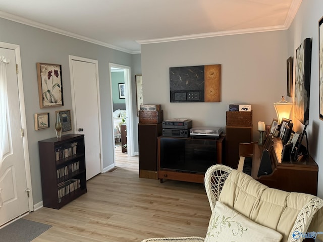 1128 Brashiers Chapel Rd, Arab, AL 35016 - living area featuring light wood finished floors and ornamental molding