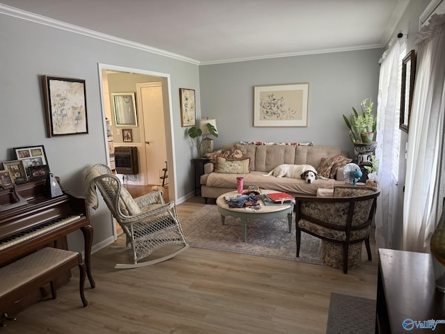 1128 Brashiers Chapel Rd, Arab, AL 35016 - living room with crown molding, heating unit, and wood finished floors