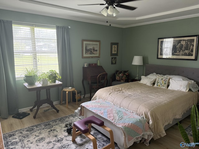 1128 Brashiers Chapel Rd, Arab, AL 35016 - bedroom featuring wood finished floors, crown molding, and a ceiling fan