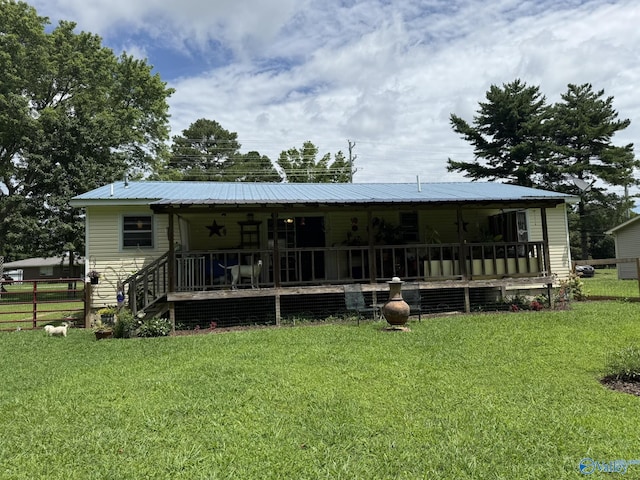 1128 Brashiers Chapel Rd, Arab, AL 35016 - rear view of house with a porch and a metal roof