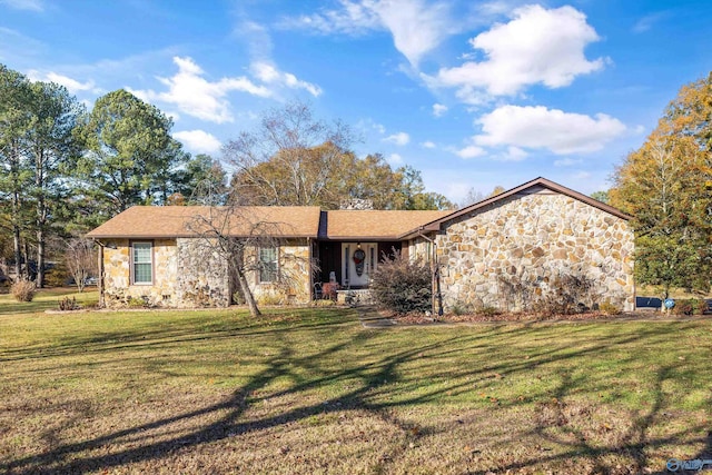 ranch-style home with a front yard