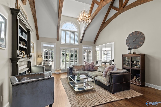 living room with beam ceiling, high vaulted ceiling, wood-type flooring, and an inviting chandelier