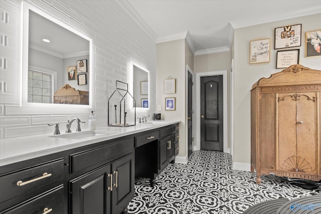 bathroom with vanity, ornamental molding, and brick wall