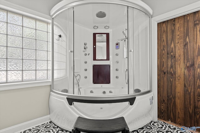 room details featuring independent shower and bath and tile patterned floors