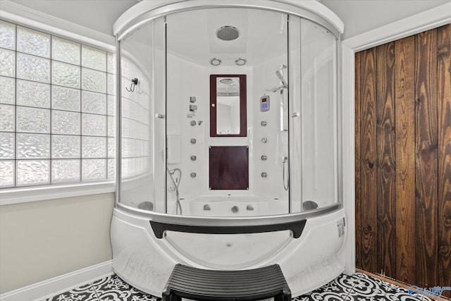 4716 Slalom Run SE, Owens Cross Roads, AL 35763 - bathroom featuring tile patterned floors, plenty of natural light, and baseboards
