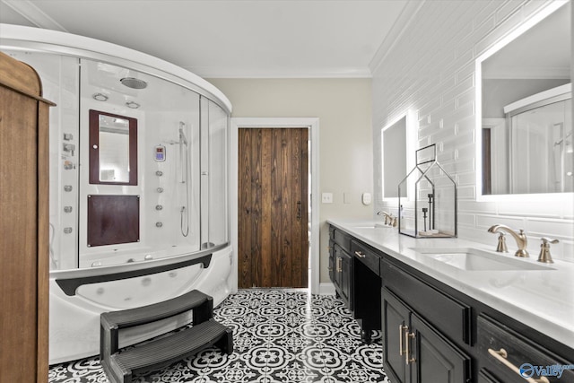 4716 Slalom Run SE, Owens Cross Roads, AL 35763 - full bathroom with crown molding, double vanity, enclosed tub / shower combo, and a sink