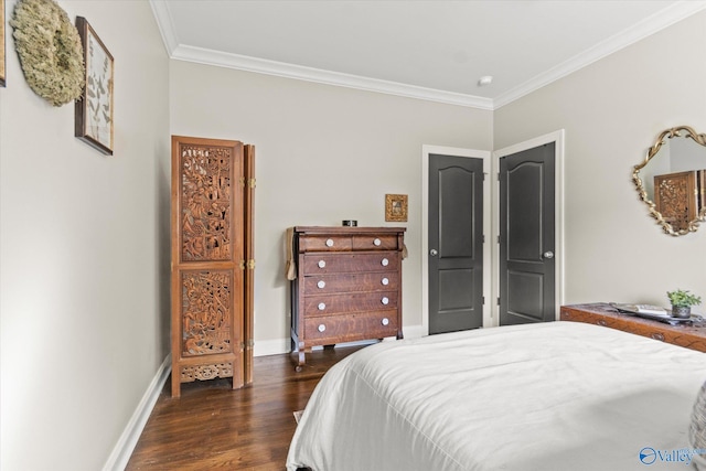 bedroom with crown molding and dark hardwood / wood-style floors