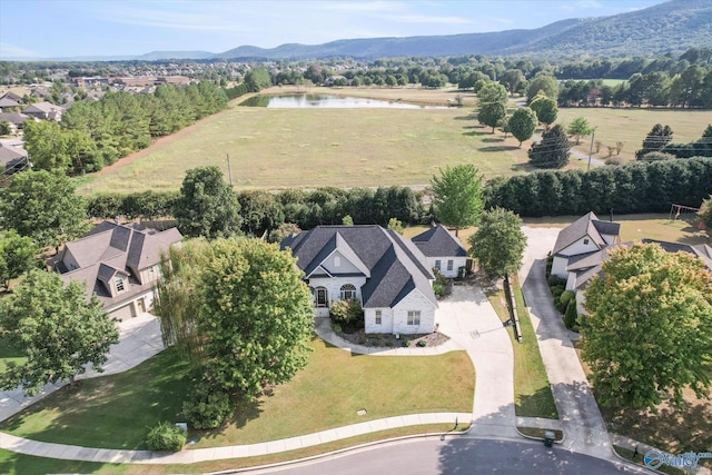 aerial view with a water and mountain view