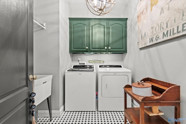 4716 Slalom Run SE, Owens Cross Roads, AL 35763 - laundry area featuring an inviting chandelier, separate washer and dryer, baseboards, and cabinet space