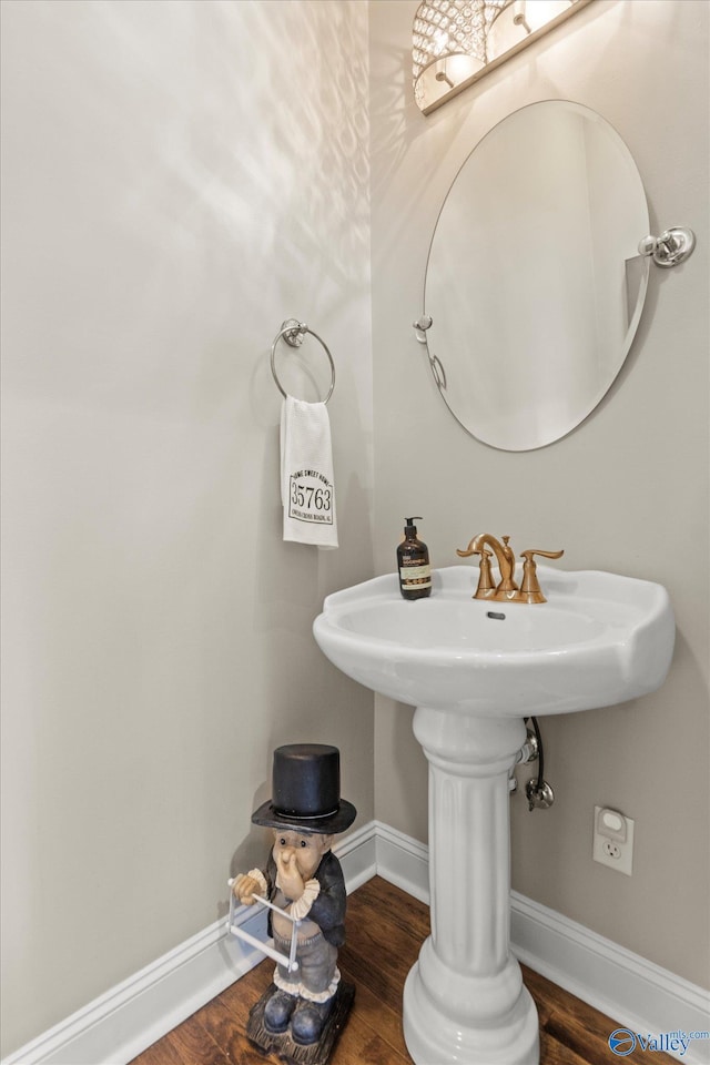 4716 Slalom Run SE, Owens Cross Roads, AL 35763 - bathroom featuring baseboards and wood finished floors