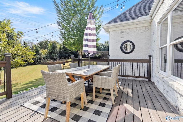 4716 Slalom Run SE, Owens Cross Roads, AL 35763 - wooden terrace with a yard and outdoor dining space