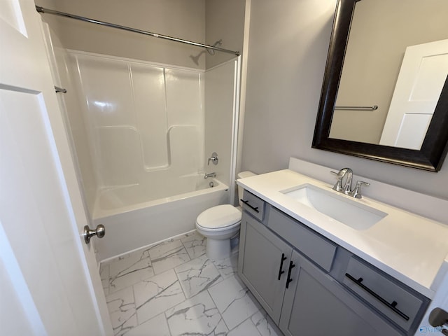 full bathroom with washtub / shower combination, marble finish floor, vanity, and toilet