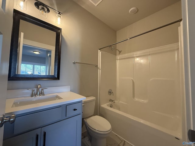 bathroom featuring toilet, washtub / shower combination, and vanity