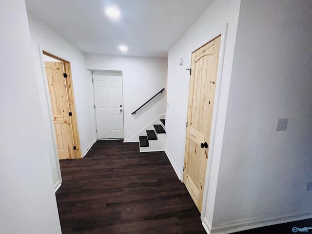 corridor featuring dark hardwood / wood-style floors