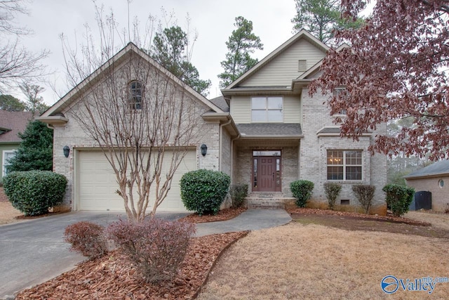 view of front of property featuring a garage