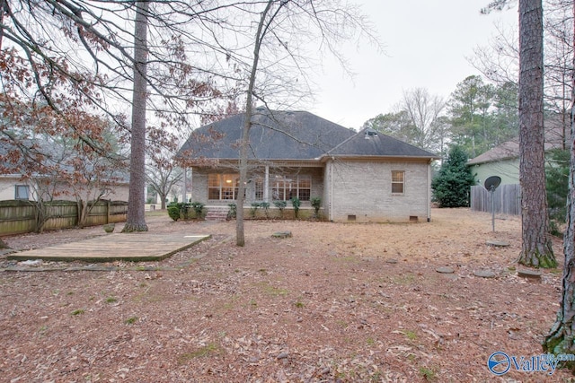 rear view of property featuring a patio area