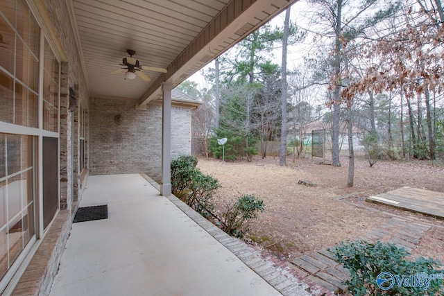 view of patio featuring ceiling fan