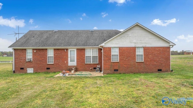 23311 Toone Rd, Elkmont, AL 35620 - back of property featuring brick siding, crawl space, a yard, and a patio area