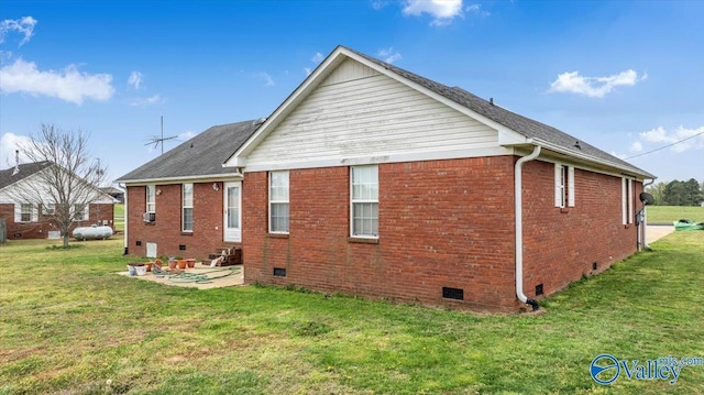 23311 Toone Rd, Elkmont, AL 35620 - rear view of property with crawl space, a patio area, brick siding, and a yard