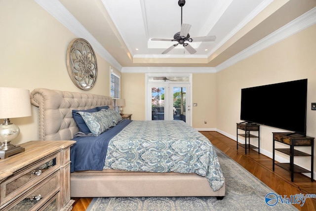 bedroom featuring a raised ceiling, ceiling fan, crown molding, french doors, and access to outside