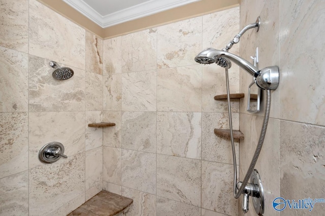 details with a tile shower and ornamental molding