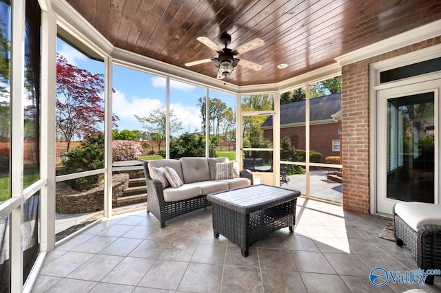 sunroom / solarium with outdoor lounge area, a ceiling fan, and a wealth of natural light