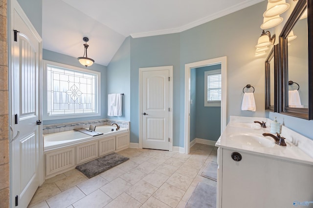 bathroom with a healthy amount of sunlight, tile patterned floors, a tub to relax in, and double sink vanity