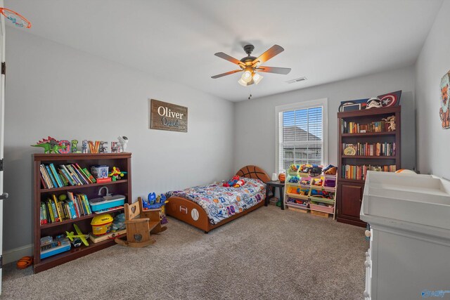 carpeted bedroom featuring ceiling fan