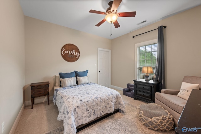 bedroom featuring visible vents, a ceiling fan, carpet flooring, and baseboards