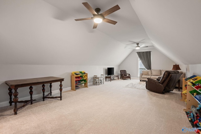 rec room featuring carpet, ceiling fan, lofted ceiling, and baseboards