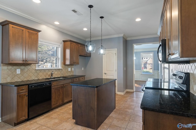 kitchen with ornamental molding, dishwasher, a center island, and dark stone counters