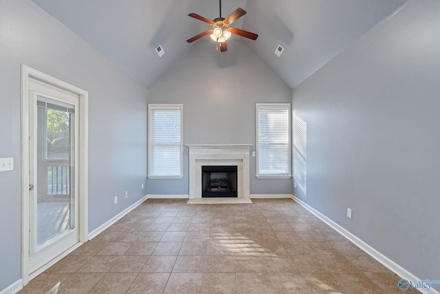 unfurnished living room featuring ceiling fan, high vaulted ceiling, and light tile patterned floors