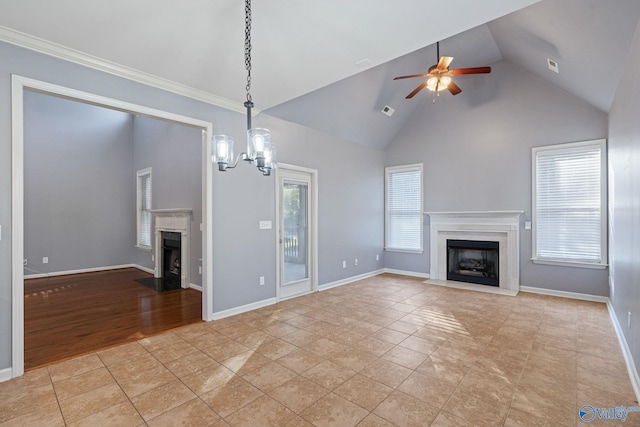 unfurnished living room with light hardwood / wood-style floors, high vaulted ceiling, and ceiling fan with notable chandelier