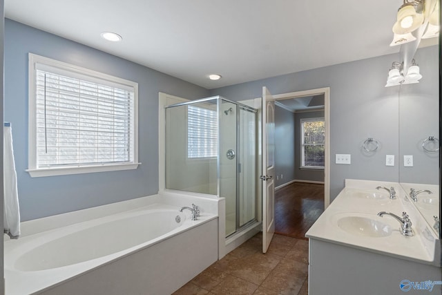 bathroom featuring vanity, tile patterned floors, and separate shower and tub