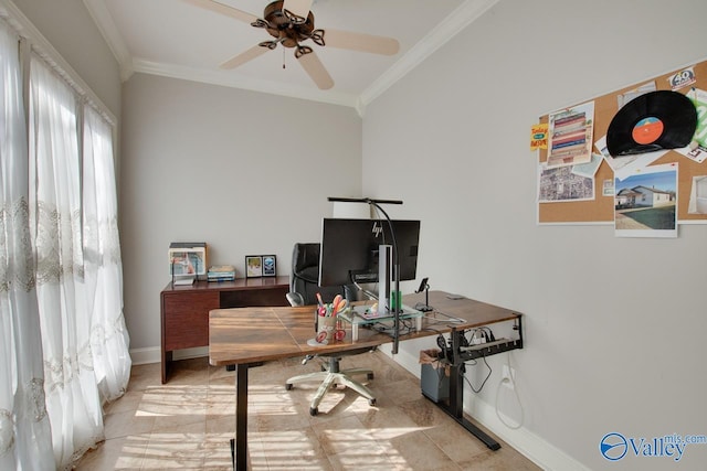 office space with ornamental molding, a ceiling fan, and baseboards