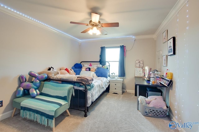 bedroom featuring ornamental molding, carpet flooring, ceiling fan, and baseboards