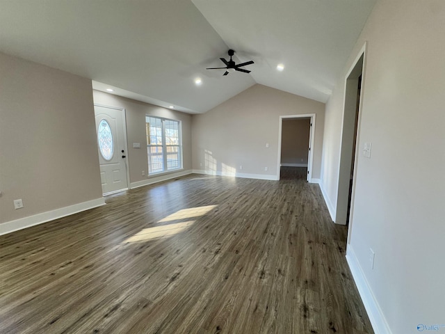 unfurnished living room featuring ceiling fan, lofted ceiling, and dark hardwood / wood-style flooring