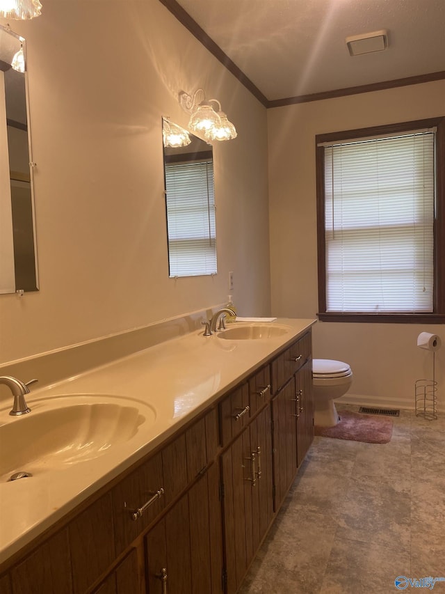 216 Carol Ave, Gadsden, AL 35904 - full bath with toilet, ornamental molding, and double vanity