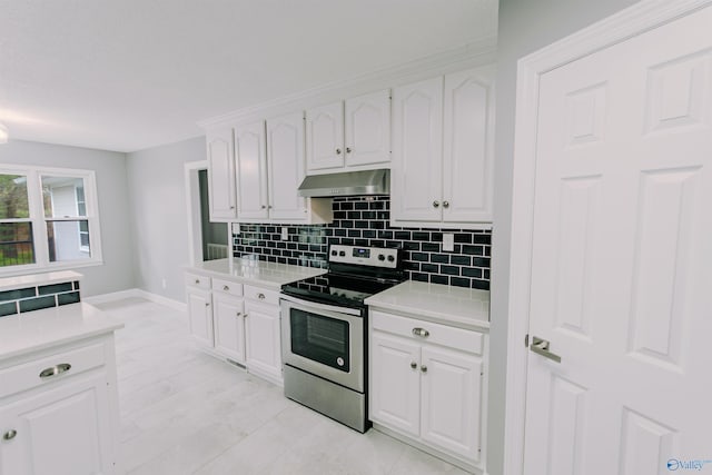kitchen with stainless steel range with electric stovetop, white cabinets, light countertops, and ventilation hood