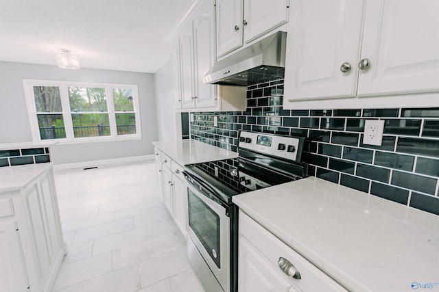 kitchen with white cabinets, decorative backsplash, electric range, and under cabinet range hood