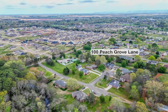 birds eye view of property with a residential view