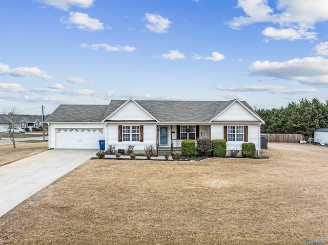 single story home with a garage and a front yard